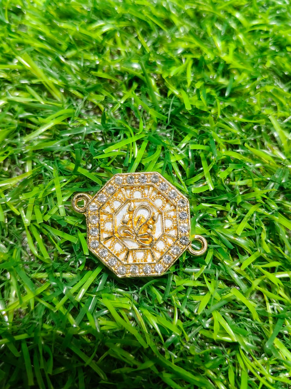 Nagneshi Rakhi Charm Octagonal Gold Frame with Lotus Motif & American Diamond Border