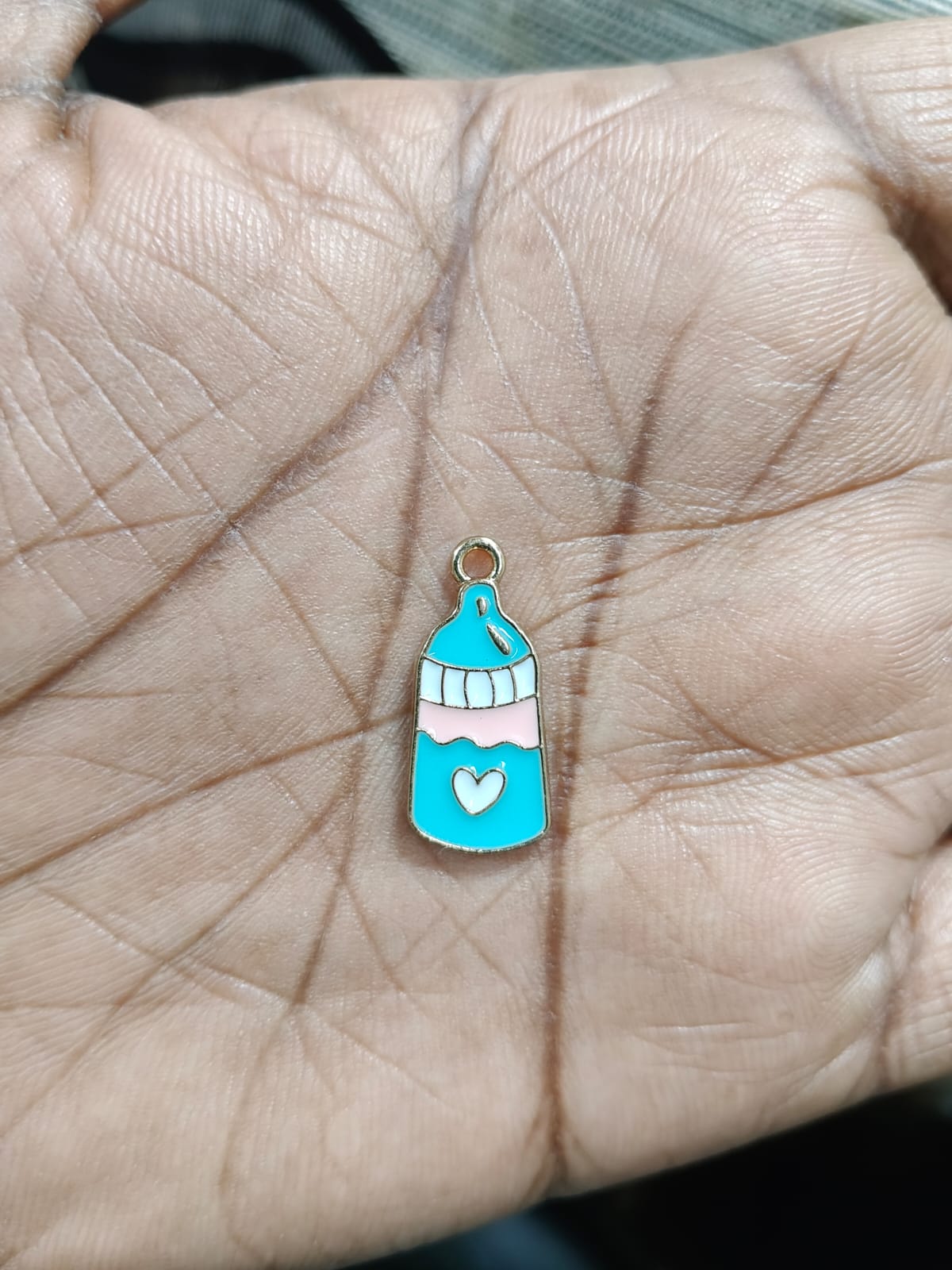 NAGNESHI Baby Bottle Enamel Charms - Gold Tone Teal & Pink Milk Bottle Pendants with Heart Detail - DIY Jewelry Making Supplies for Baby Shower Favors, Bracelets, and Necklaces