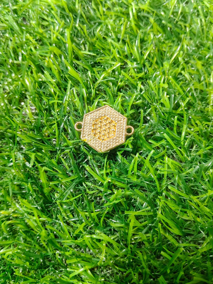 Nagneshi Elegant Rakhi Charm Hexagonal Gold Frame with American Diamond & Mother-of-Pearl Inlay