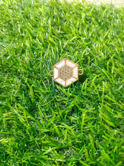 Nagneshi Elegant Rakhi Charm Hexagonal Gold Frame with American Diamond & Mother-of-Pearl Inlay